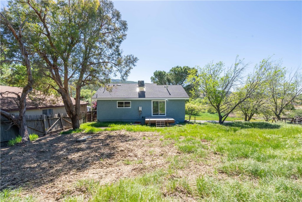 42640 Ranch Club Road Lake Hughes, CA 93532 - Photo 25 of 27 a house that has a tree in front of it