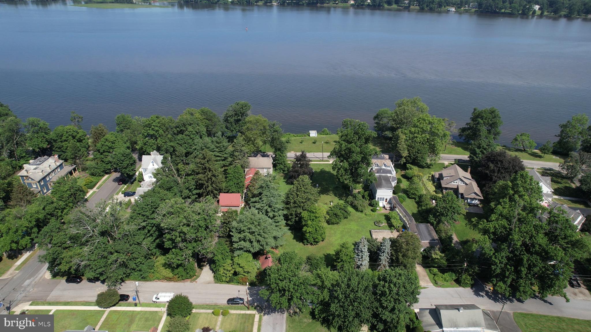 0 Delaware Avenue Delanco, NJ 08075 - Photo 18 of 39 an aerial view of a house with a yard and lake view