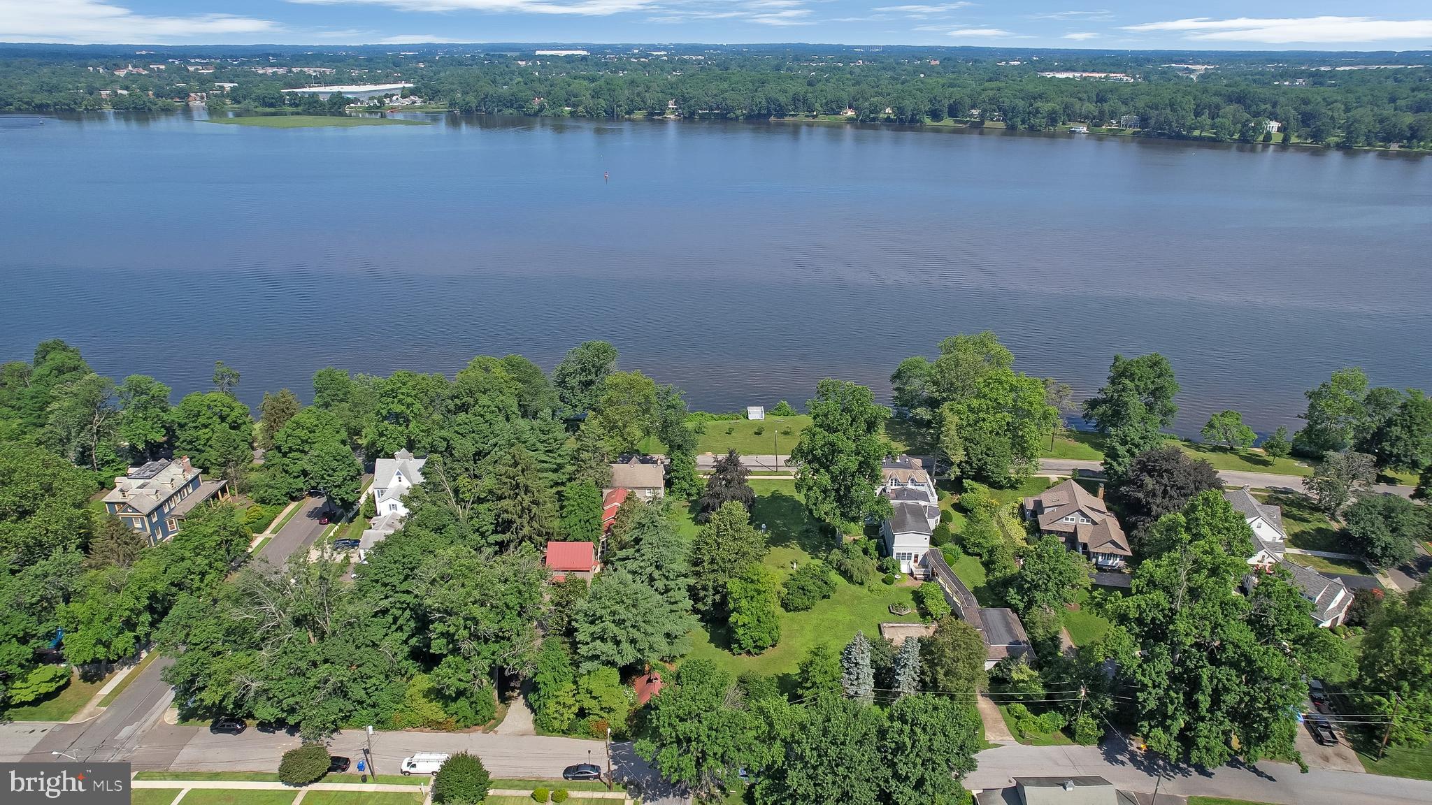 0 Delaware Avenue Delanco, NJ 08075 - Photo 19 of 39 an aerial view of a houses with a lake view