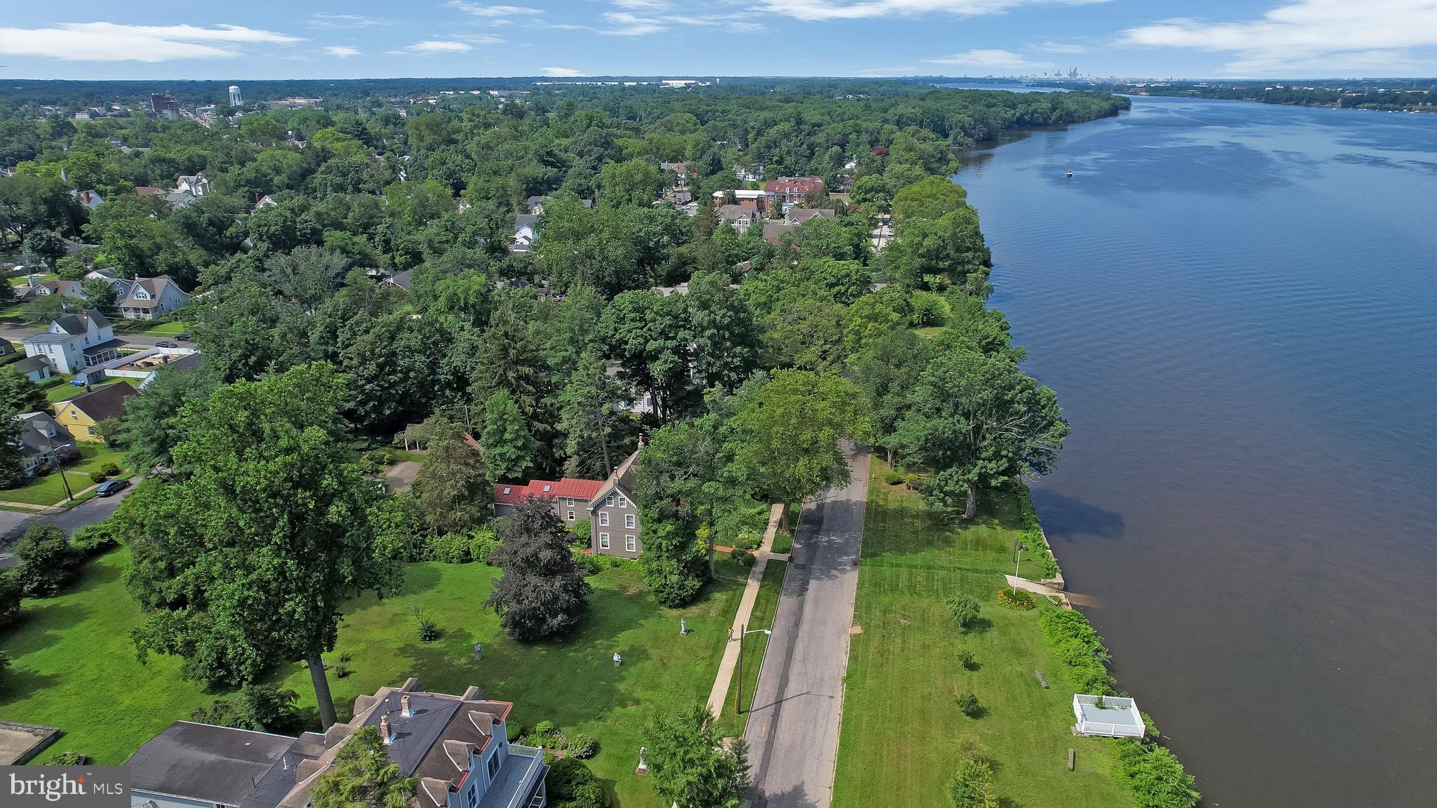 0 Delaware Avenue Delanco, NJ 08075 - Photo 28 of 39 an aerial view of green landscape with trees houses and trees