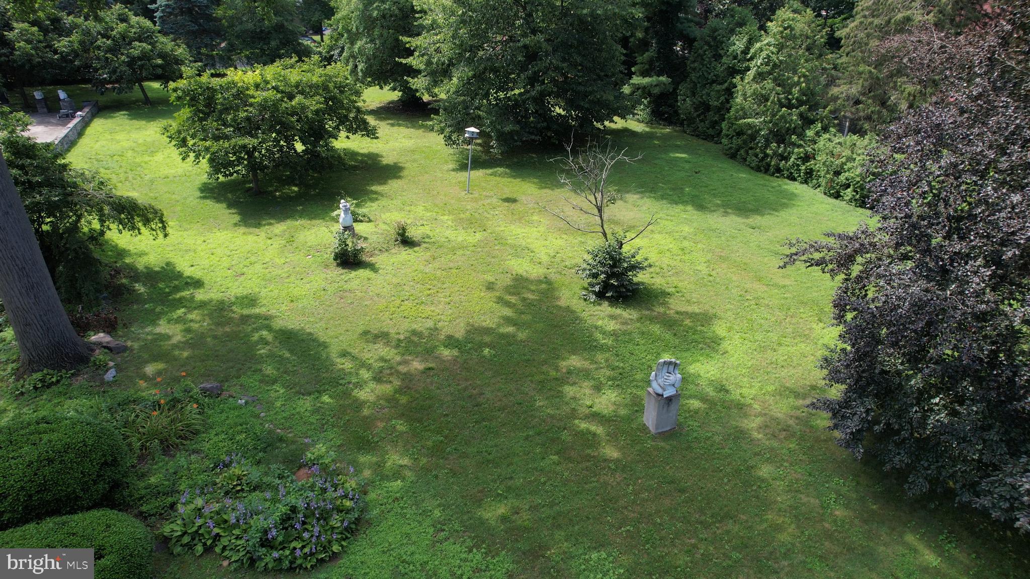 0 Delaware Avenue Delanco, NJ 08075 - Photo 30 of 39 a view of a garden with a lake view