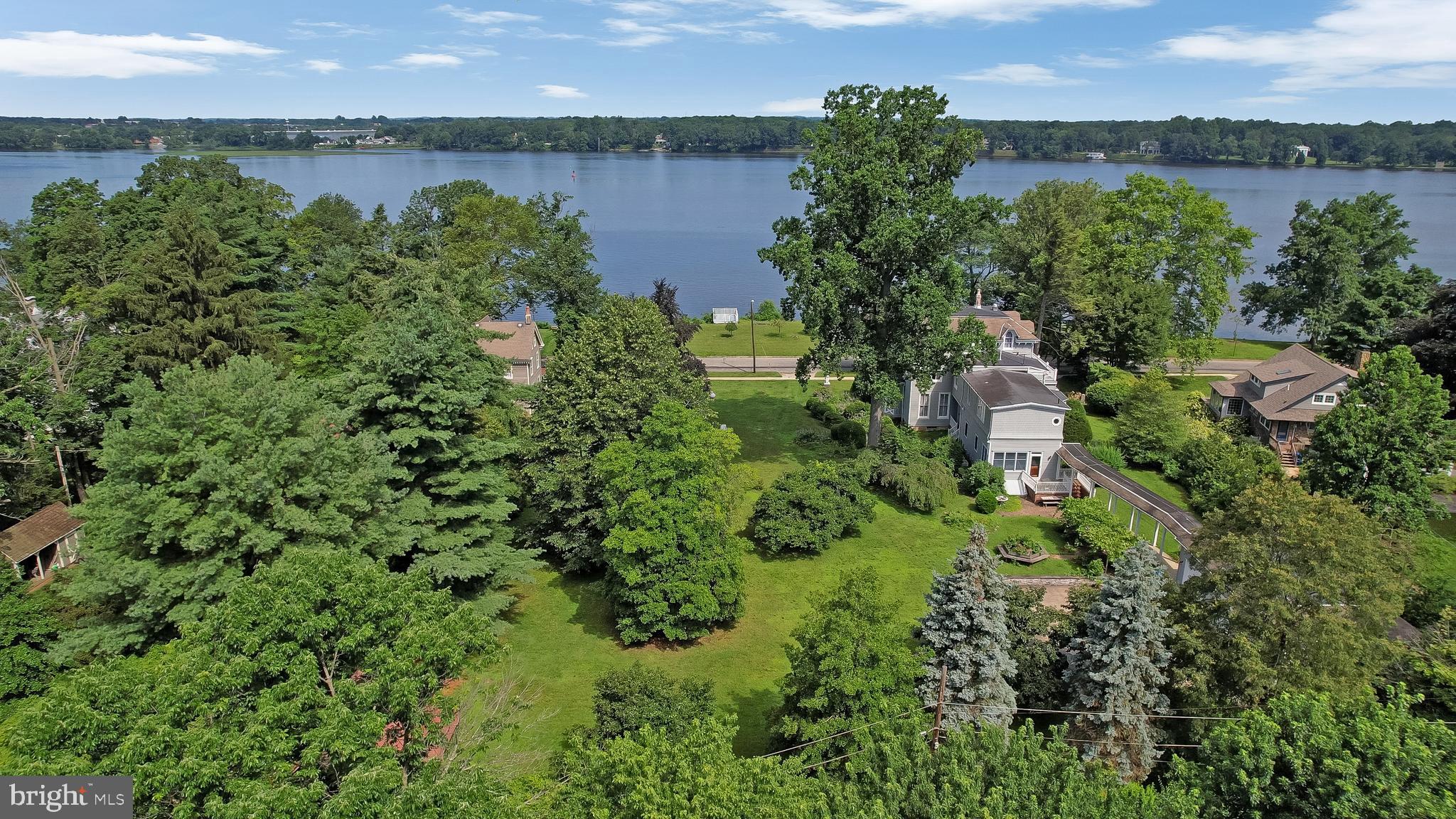 0 Delaware Avenue Delanco, NJ 08075 - Photo 33 of 39 an aerial view of a house with a yard and lake view