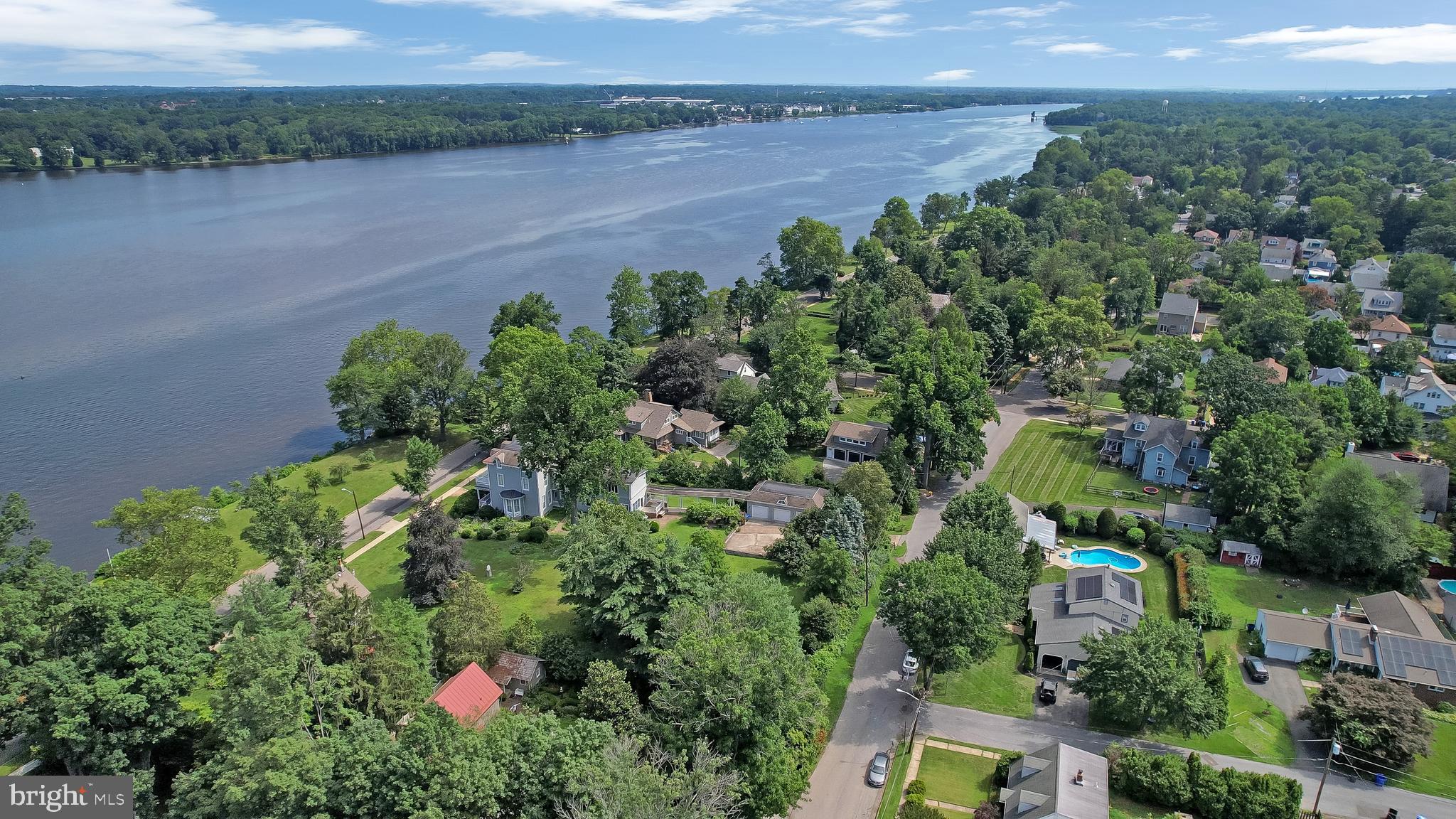 0 Delaware Avenue Delanco, NJ 08075 - Photo 35 of 39 an aerial view of a houses with a yard and lake
