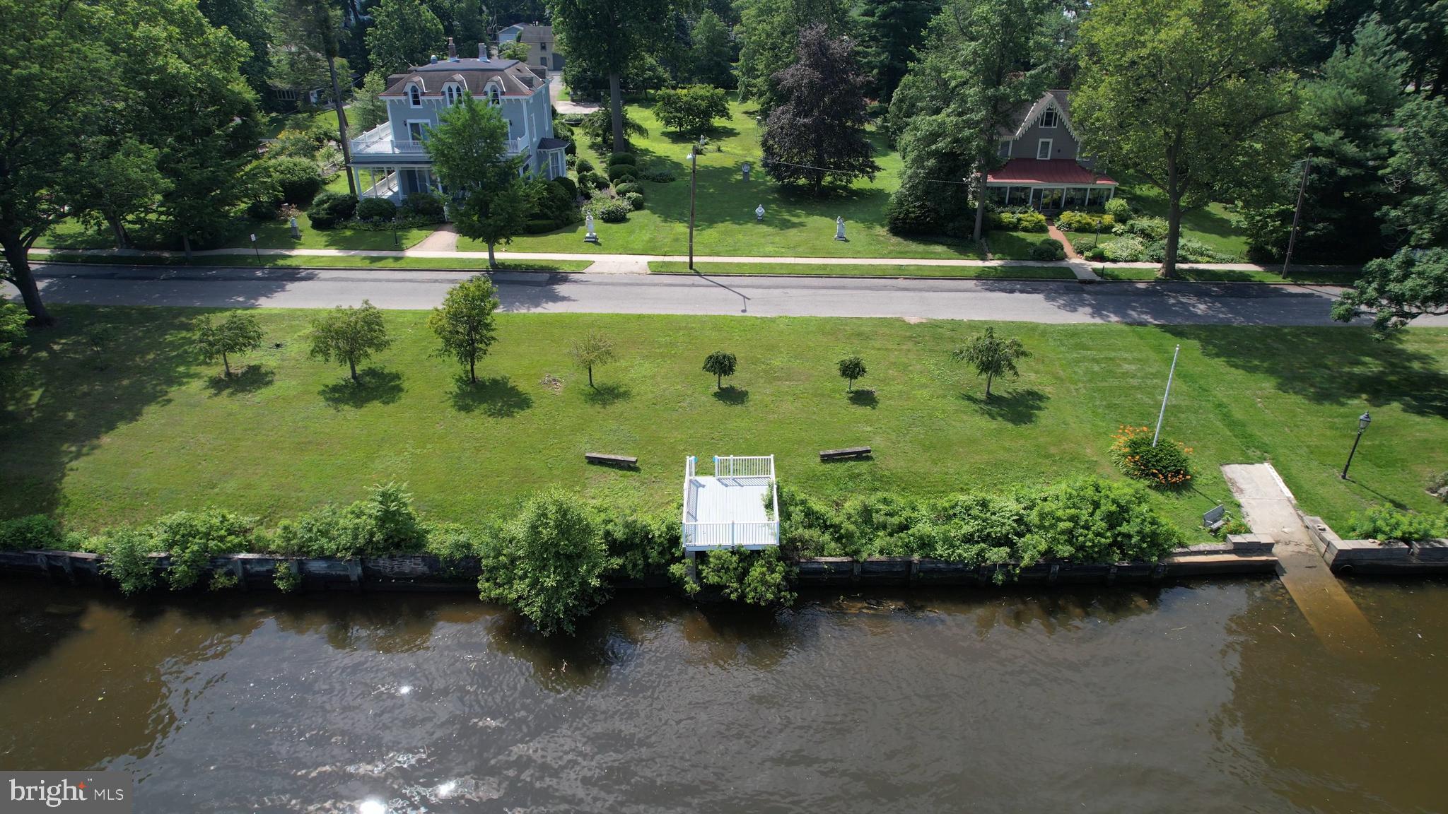0 Delaware Avenue Delanco, NJ 08075 - Photo 4 of 39 an aerial view of a house with swimming pool and outdoor seating