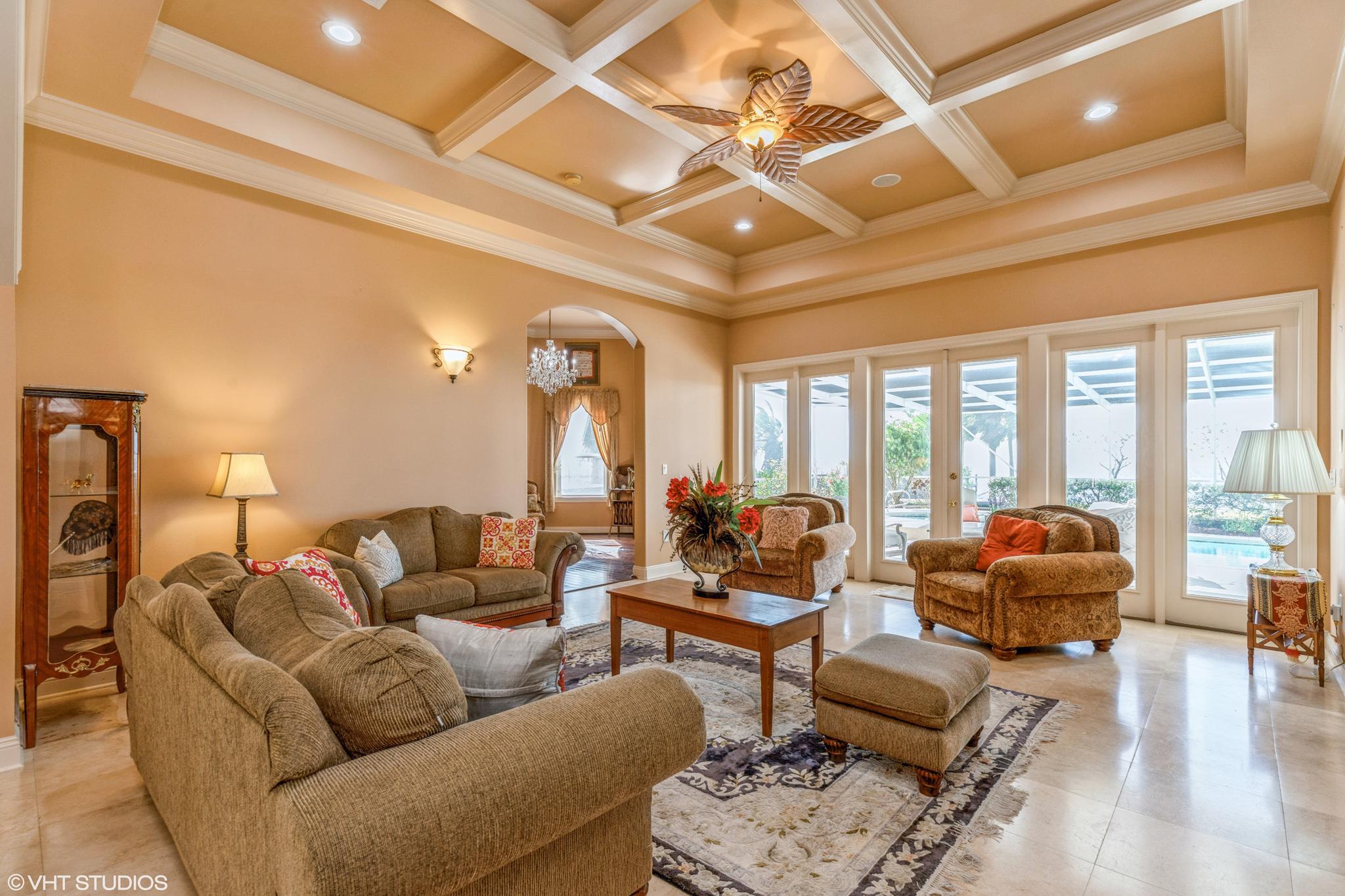 691 Driftwood Point Road Santa Rosa Beach, FL 32459 - Photo 6 of 33 a living room with furniture and a large window