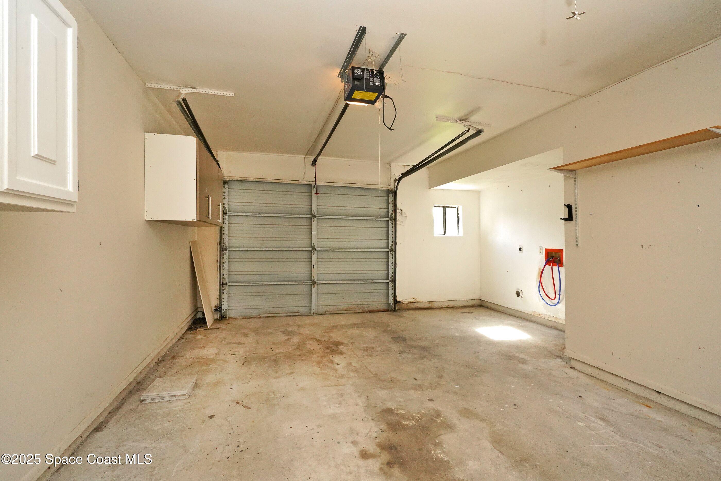 1665 Avery Road Northeast Palm Bay, FL 32905 - Photo 13 of 19 a view of empty room with stairs and mirrors