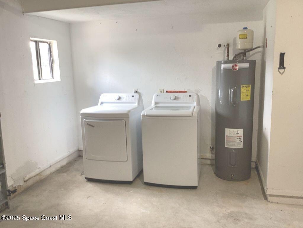 1665 Avery Road Northeast Palm Bay, FL 32905 - Photo 14 of 19 a utility room with dryer and washer