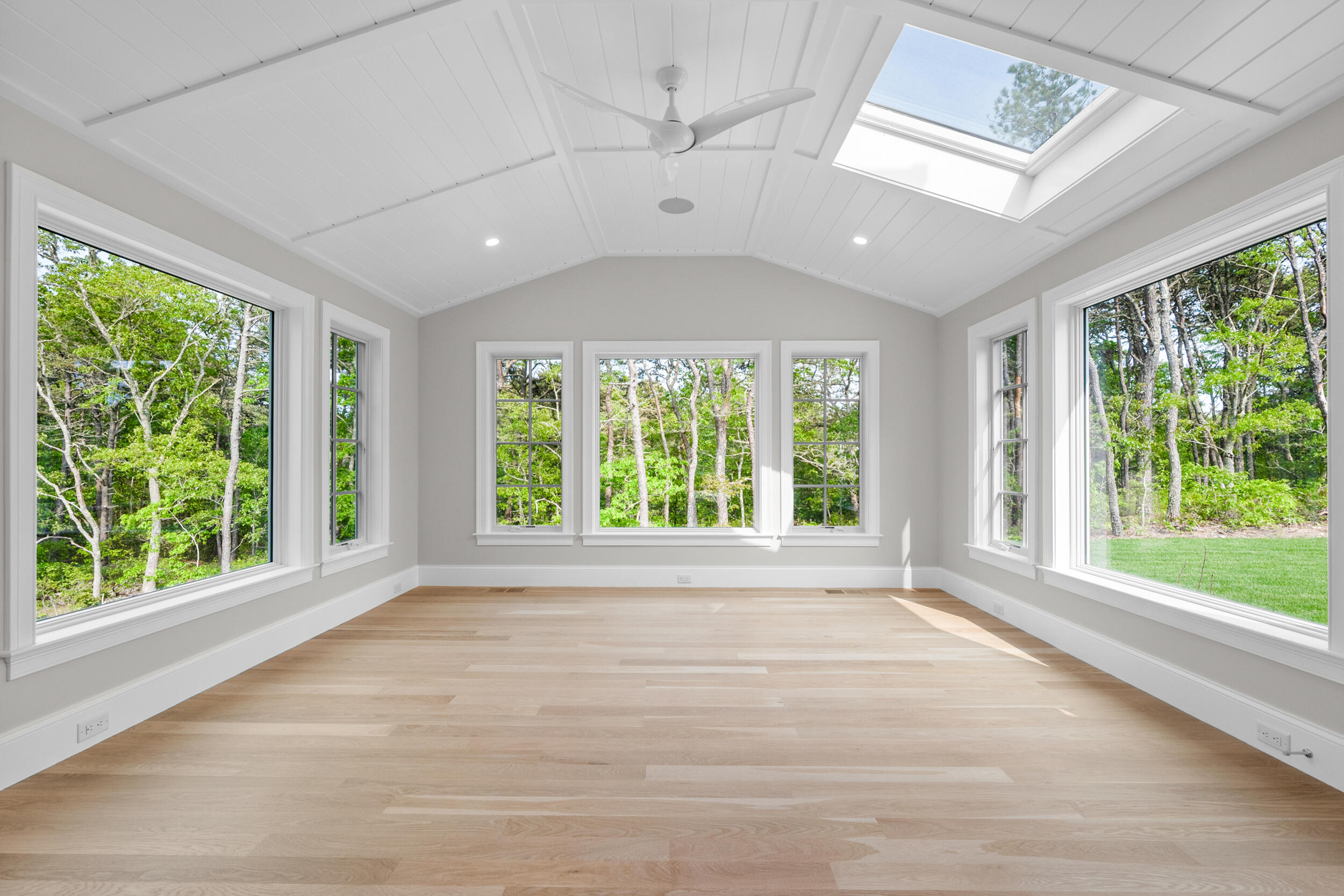 12 Turtle Run Harwich, MA 02645 - Photo 11 of 38 a view of an empty room with a window and a ceiling fan