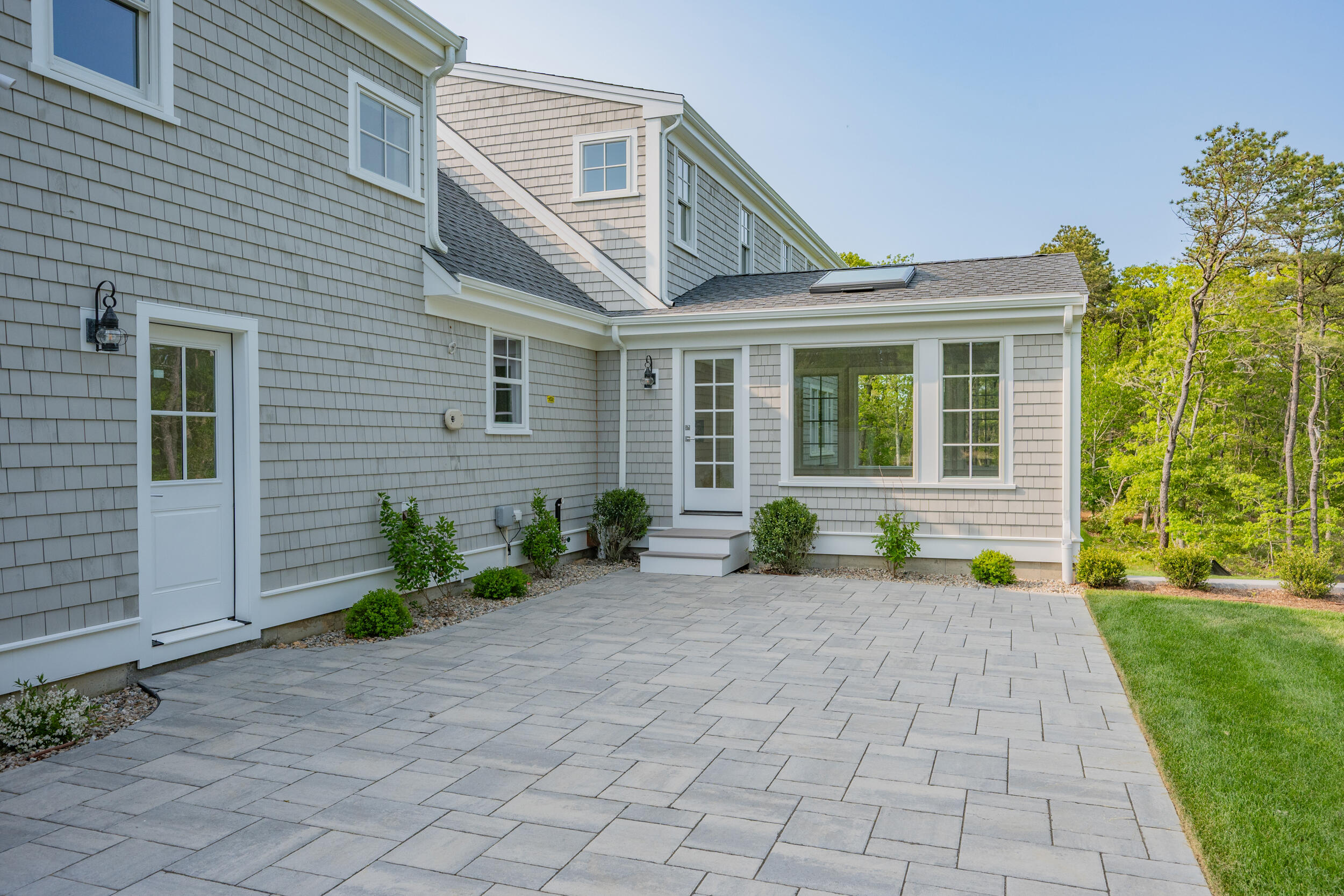 12 Turtle Run Harwich, MA 02645 - Photo 27 of 38 a front view of a house with garden