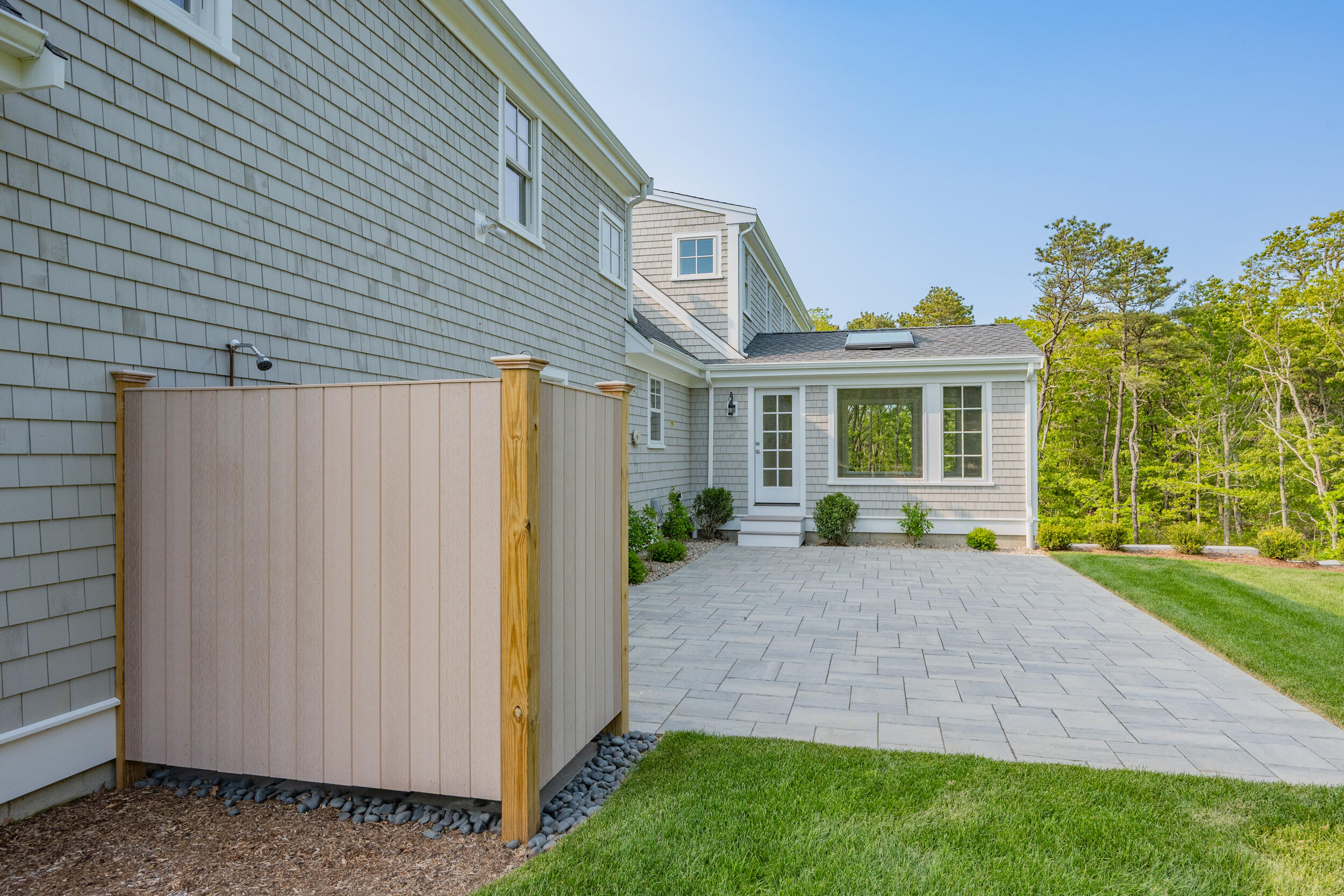 12 Turtle Run Harwich, MA 02645 - Photo 29 of 38 a view of a house with backyard and sitting area