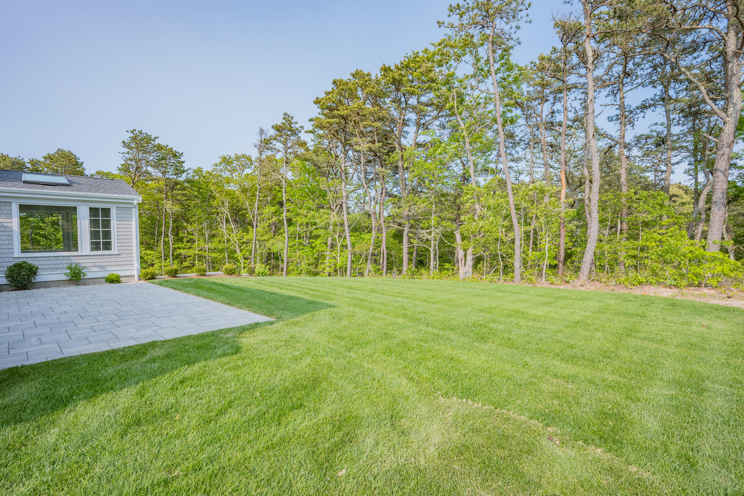 12 Turtle Run Harwich, MA 02645 - Photo 30 of 38 a front view of a house with a yard