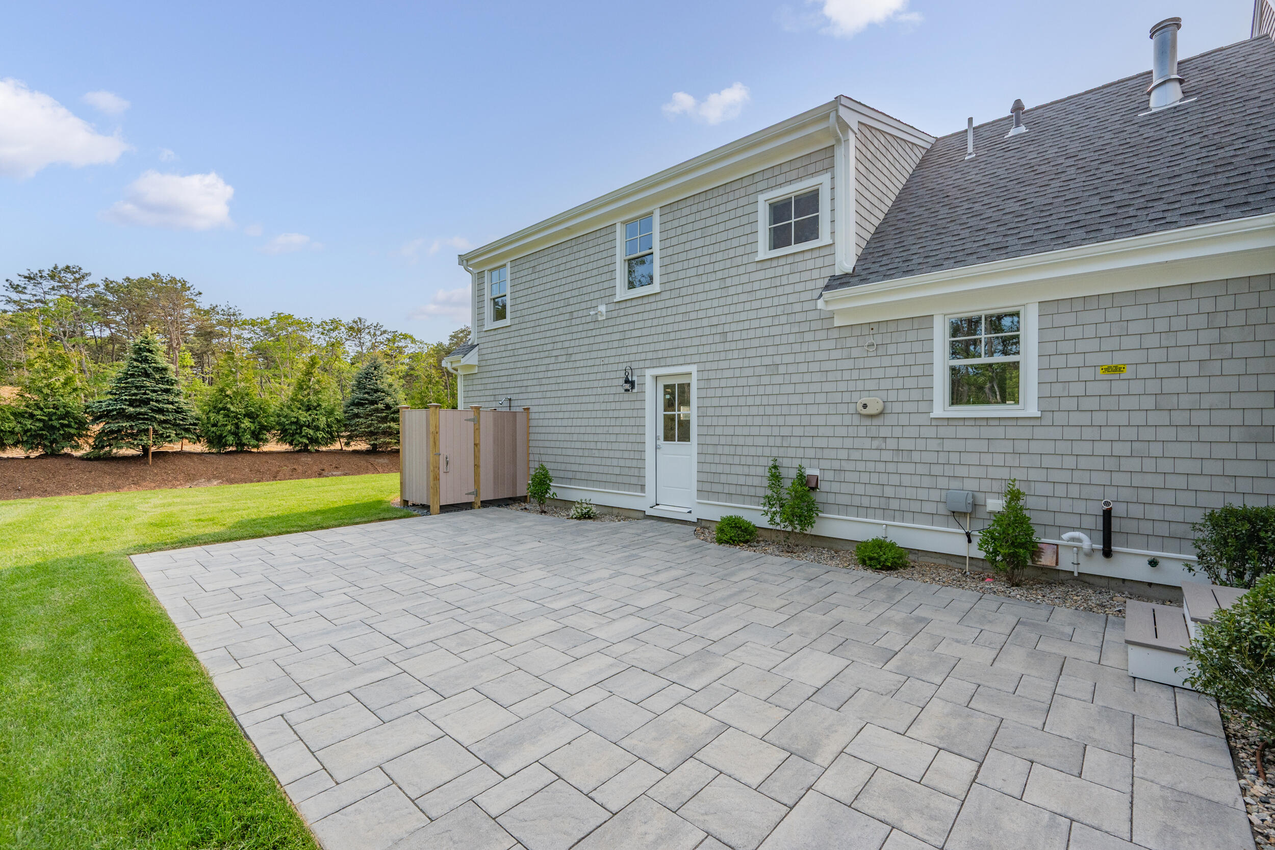 12 Turtle Run Harwich, MA 02645 - Photo 31 of 38 a front view of a house with garden