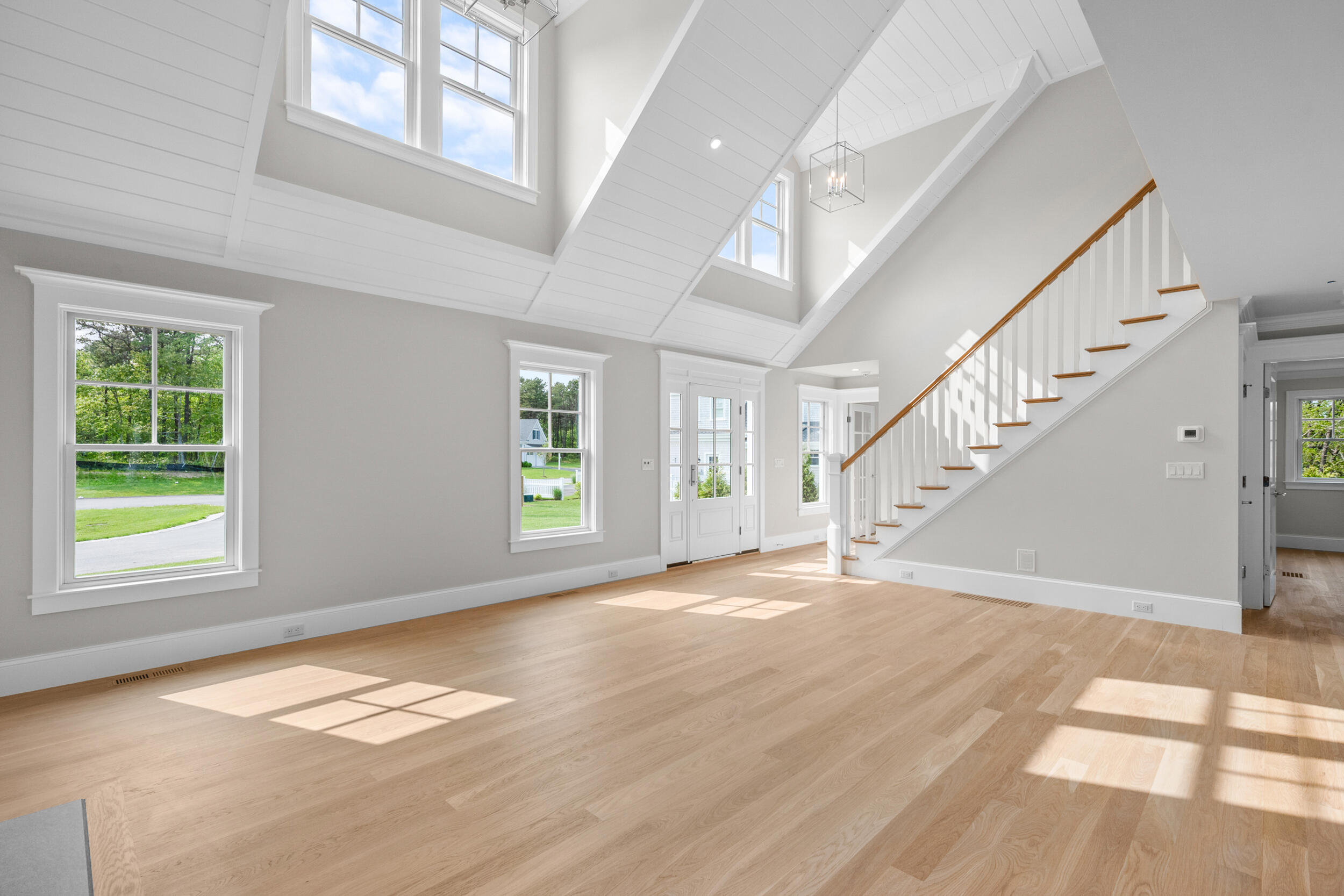 12 Turtle Run Harwich, MA 02645 - Photo 5 of 38 a view of empty room with wooden floor and fan