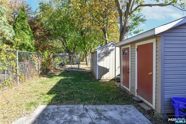 a view of a back yard with green space