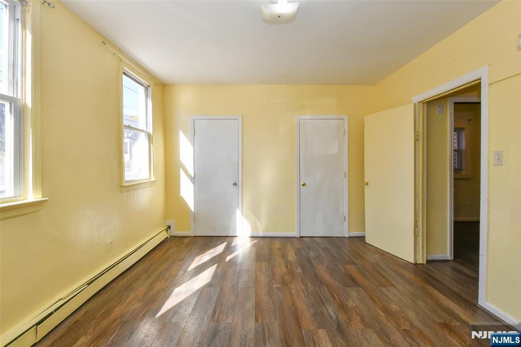 208 4th Street Passaic, NJ 07055 - Photo 16 of 28 a view of hallway with natural light