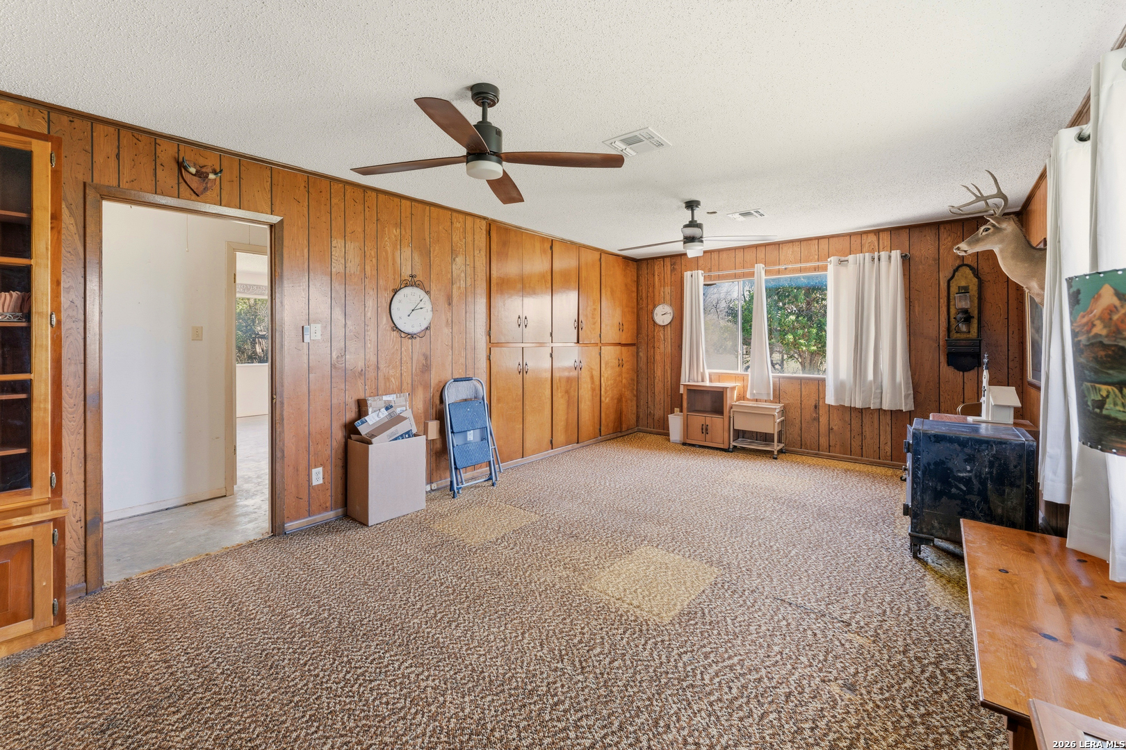 3394 Junction Highway Ingram, TX 78025 - Photo 18 of 28 a living room with furniture and a large window