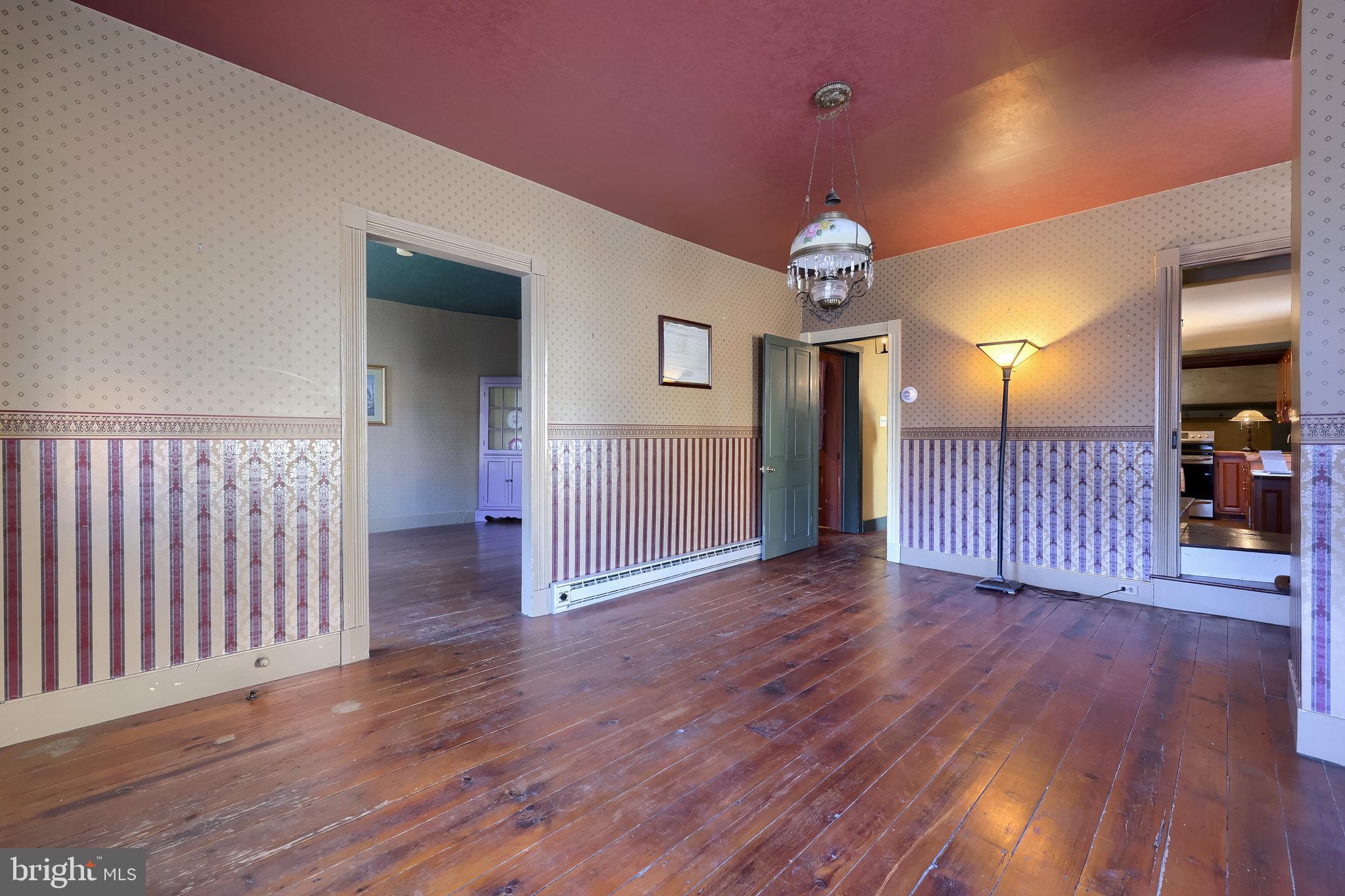 2 South Charlotte Street Manheim, PA 17545 - Photo 33 of 88 a view of a hallway with wooden floor and stairs