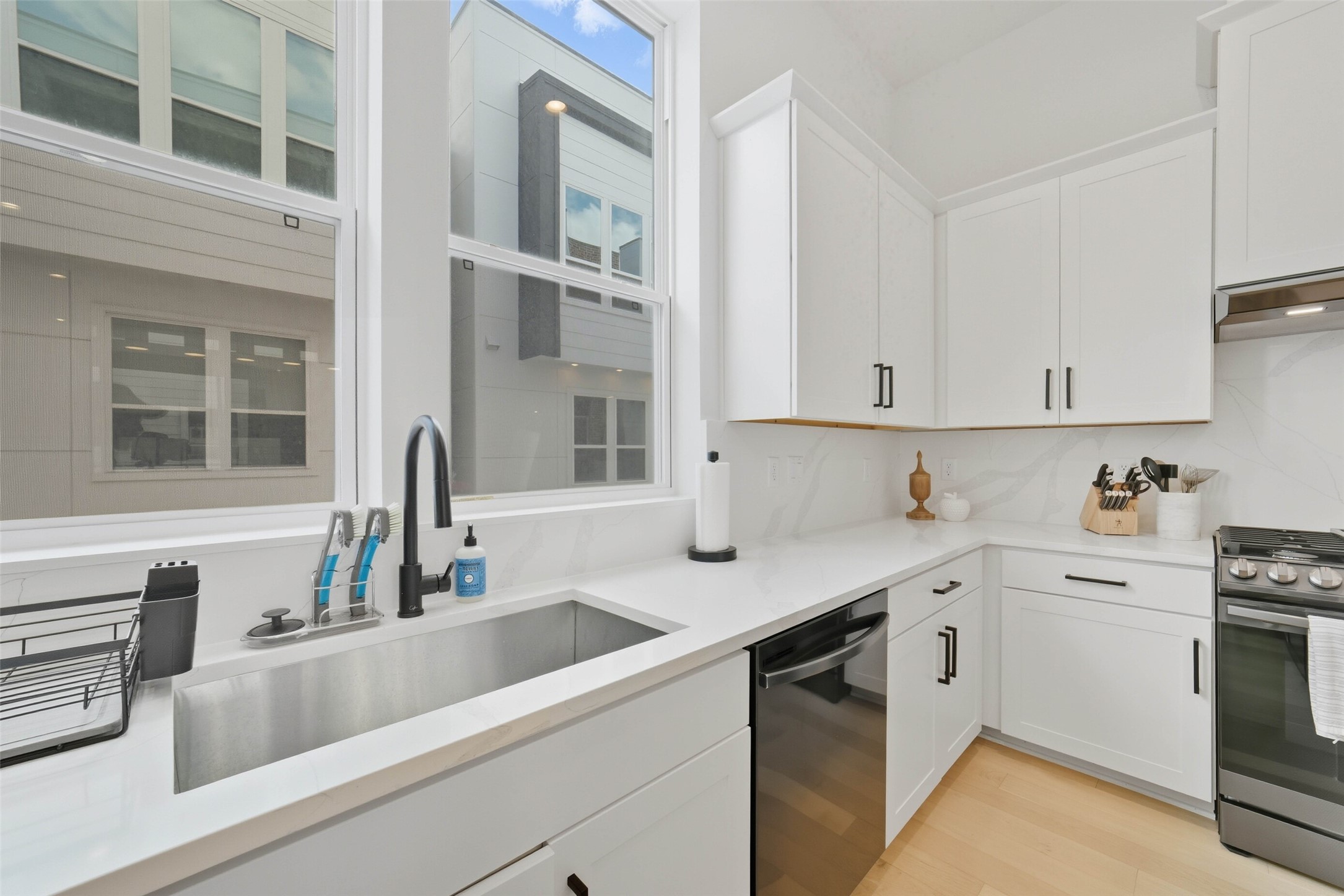 3006 Lamar Street Houston, TX 77003 - Photo 11 of 46 a view of a kitchen with cabinets