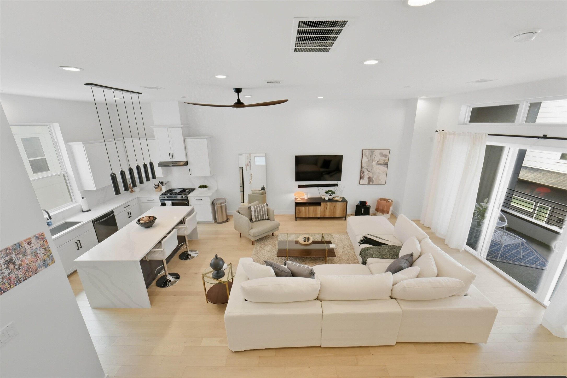 3006 Lamar Street Houston, TX 77003 - Photo 23 of 46 a living room with furniture and a flat screen tv