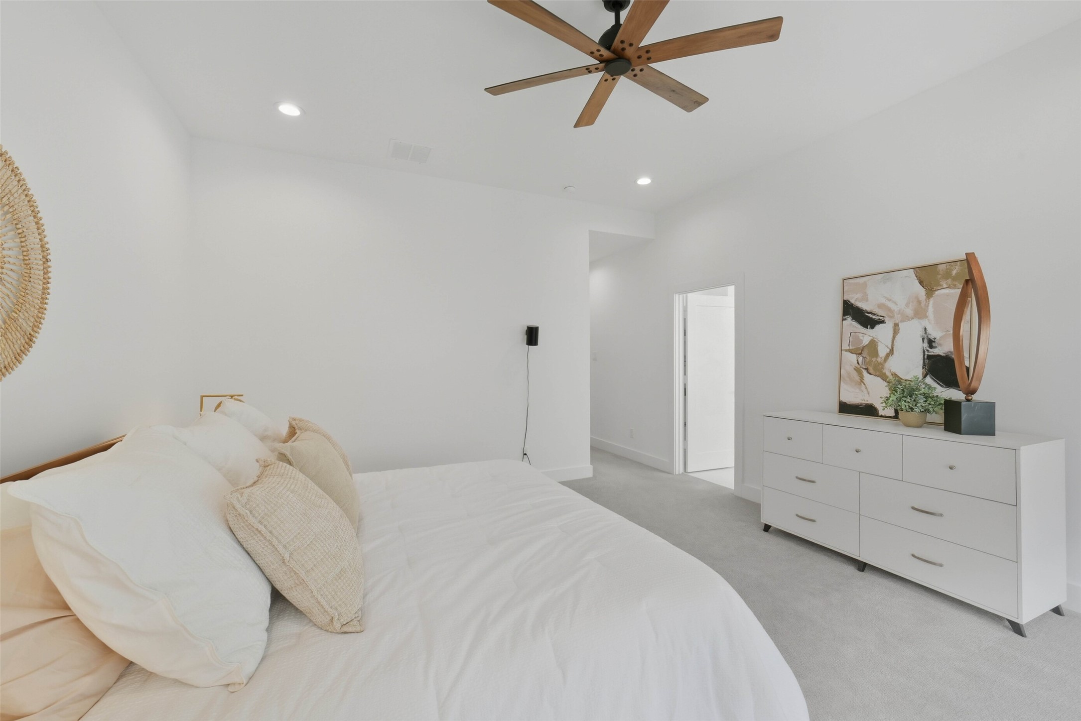 3006 Lamar Street Houston, TX 77003 - Photo 25 of 46 a bedroom with a bed and painting on the wall