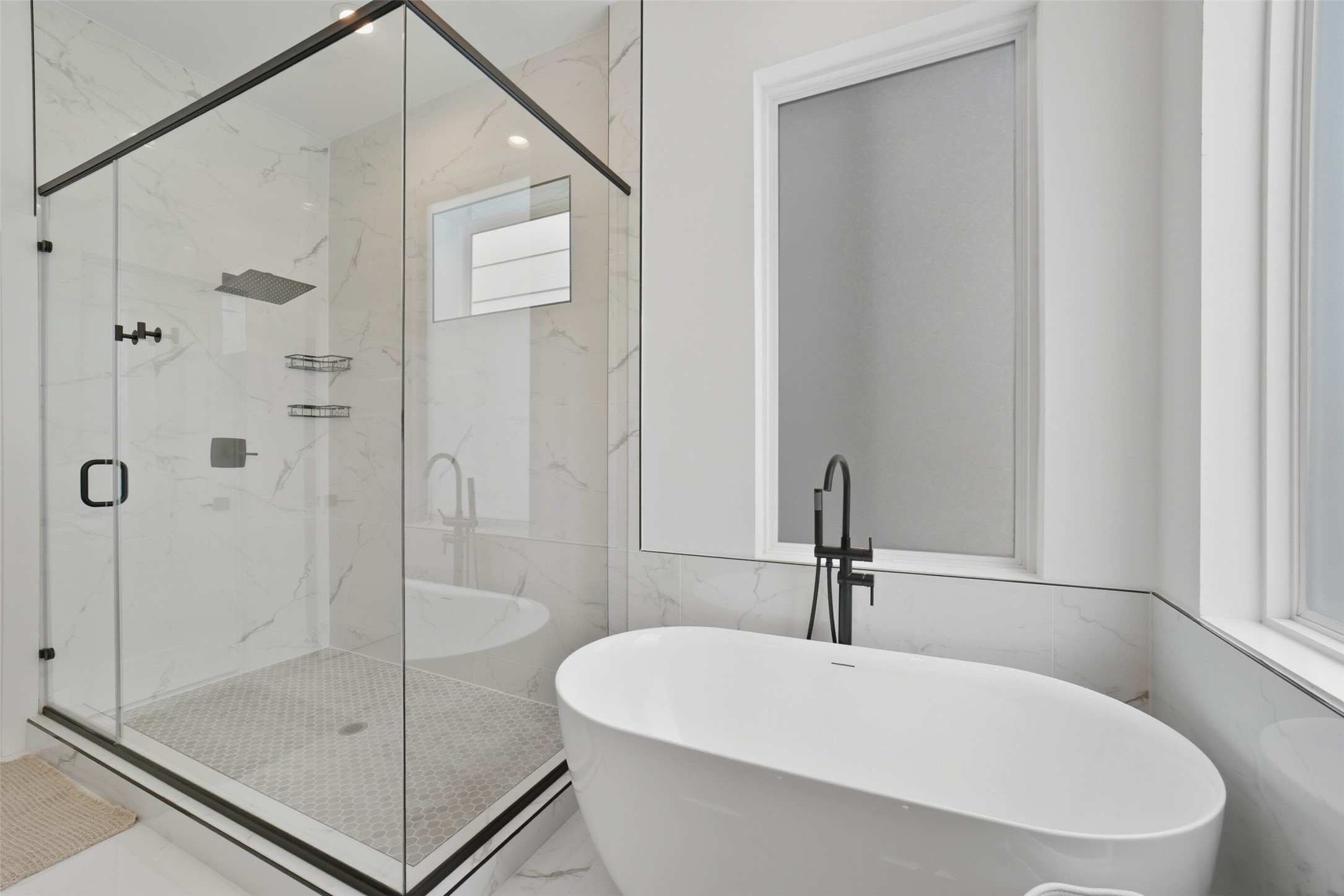 3006 Lamar Street Houston, TX 77003 - Photo 27 of 46 a white bath tub sitting next to a shower