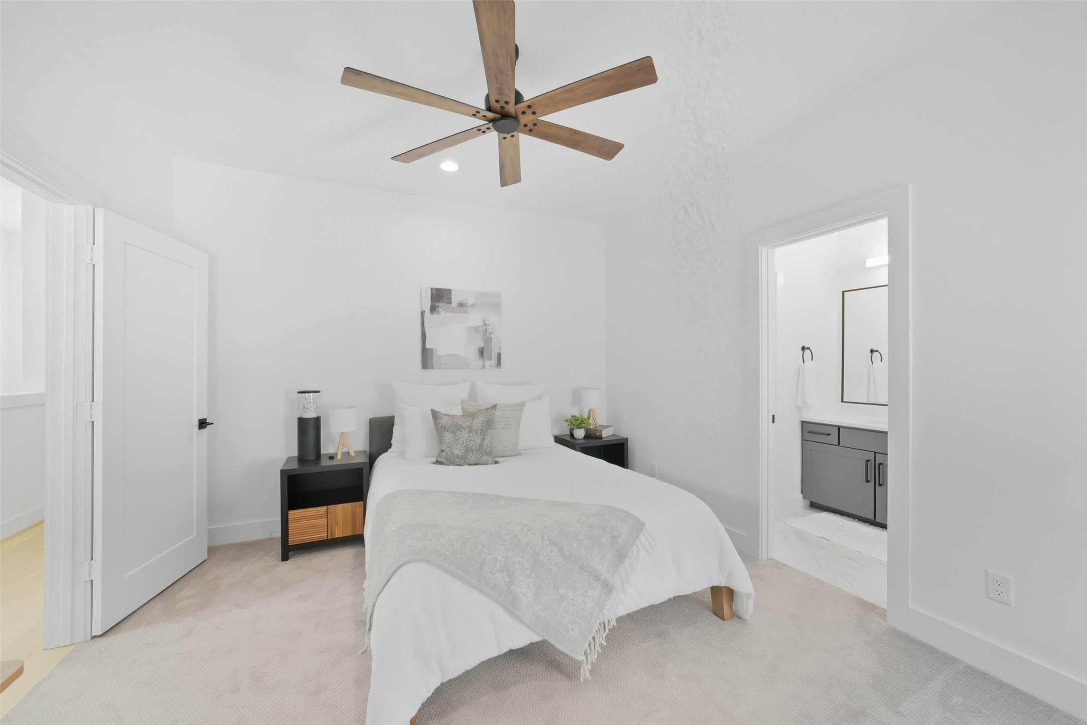 3006 Lamar Street Houston, TX 77003 - Photo 30 of 46 a bedroom with a bed and a chandelier