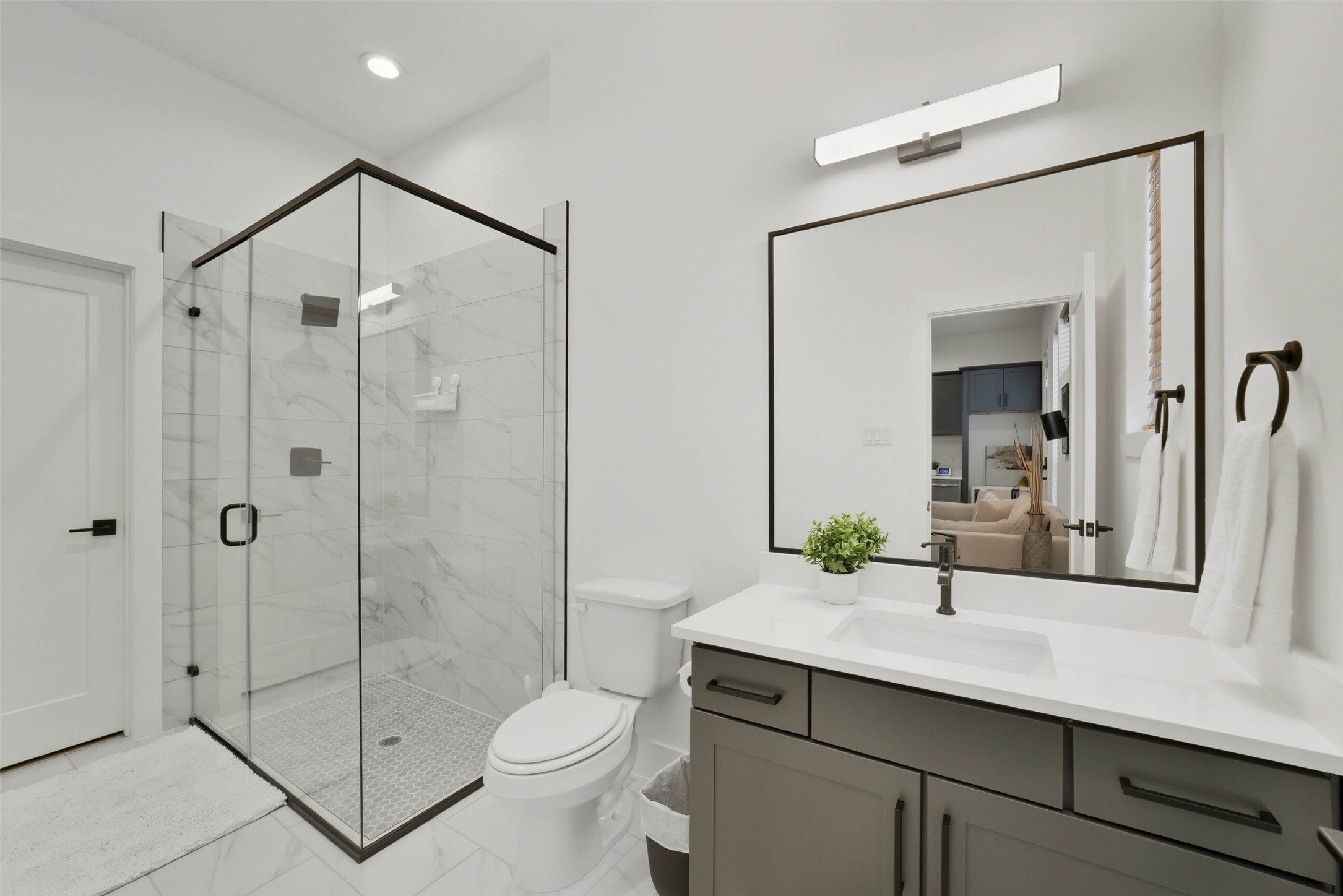 3006 Lamar Street Houston, TX 77003 - Photo 46 of 46 a bathroom with a shower sink mirror and toilet