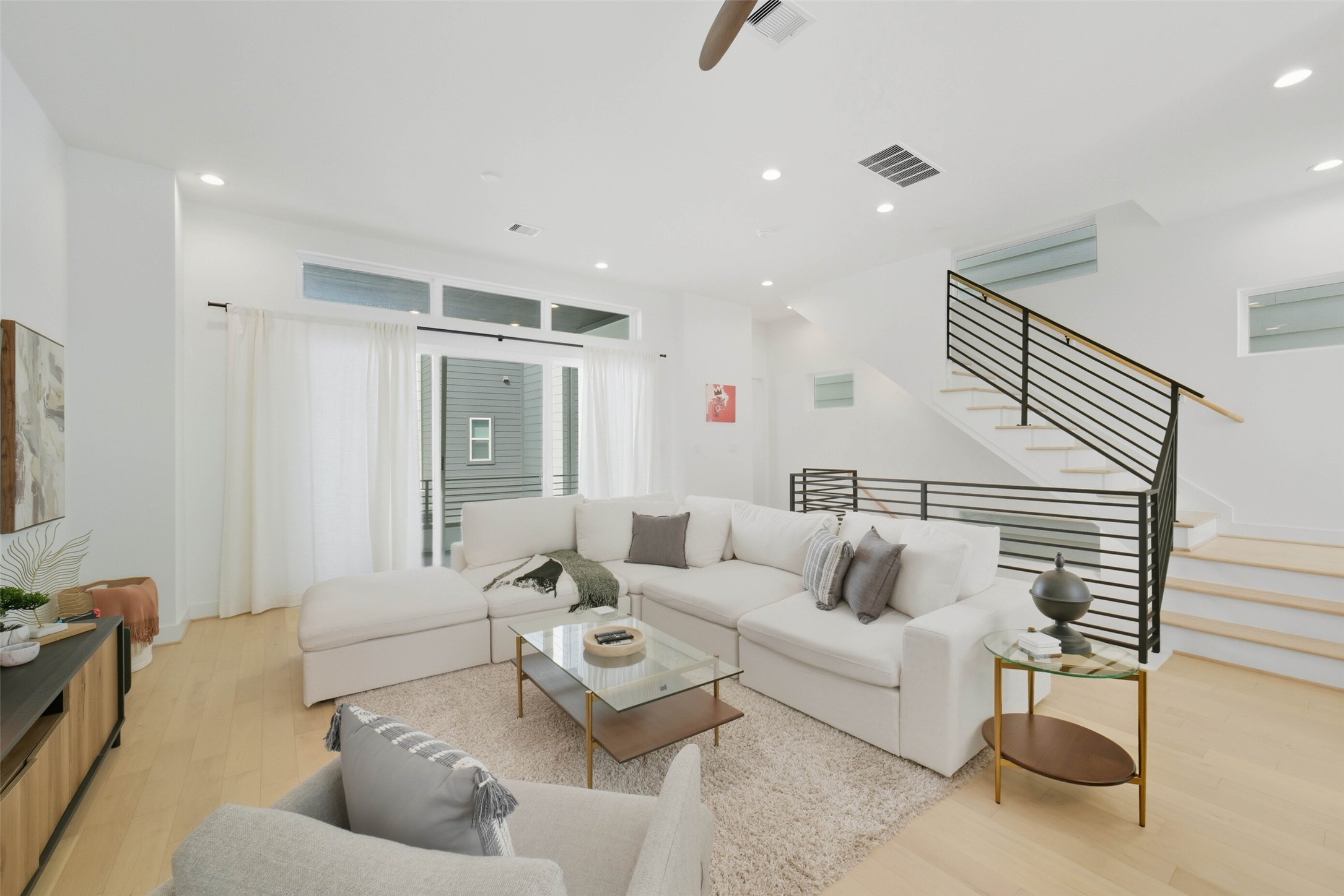 3006 Lamar Street Houston, TX 77003 - Photo 6 of 46 a living room with furniture and a ceiling fan