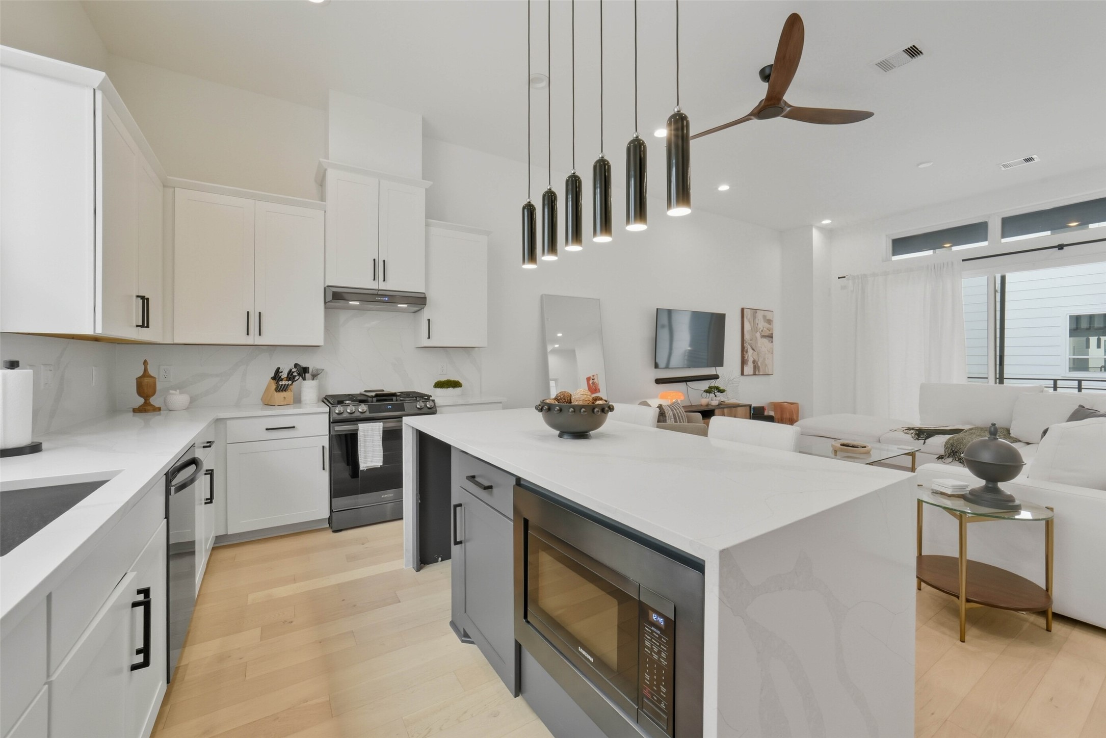 3006 Lamar Street Houston, TX 77003 - Photo 10 of 46 a kitchen with a sink appliances and cabinets