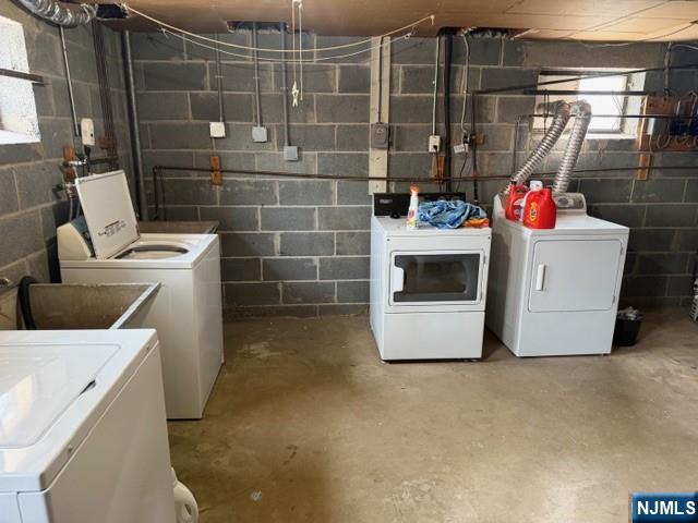 216 Brookside Avenue, Unit 1 Ho-Ho-Kus, NJ 07423 - Photo 7 of 7 a utility room with dryer and washer