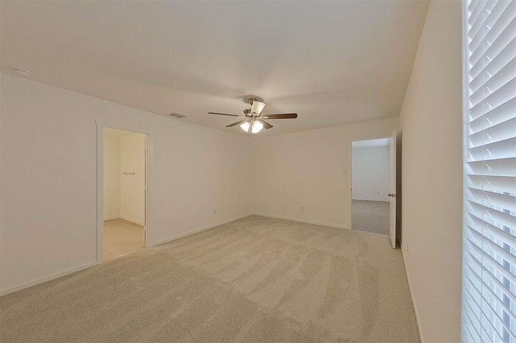 834 Ginkgo Way Princeton, TX 75407 - Photo 16 of 27 a view of a livingroom with a ceiling fan and window