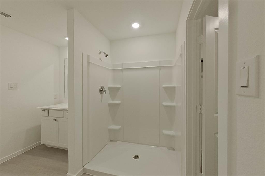 834 Ginkgo Way Princeton, TX 75407 - Photo 18 of 27 a bathroom with a shower