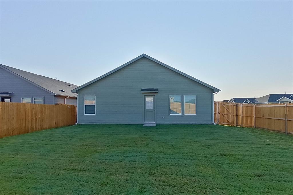 834 Ginkgo Way Princeton, TX 75407 - Photo 22 of 27 a view of a back yard of the house
