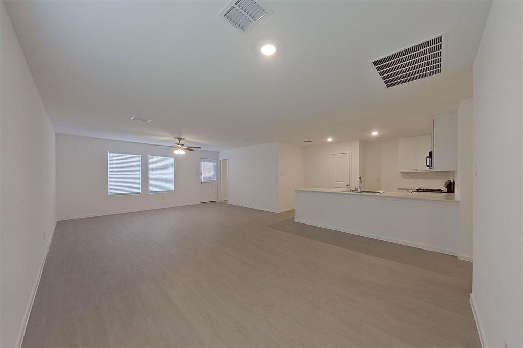 834 Ginkgo Way Princeton, TX 75407 - Photo 3 of 27 a view of an empty room and kitchen view
