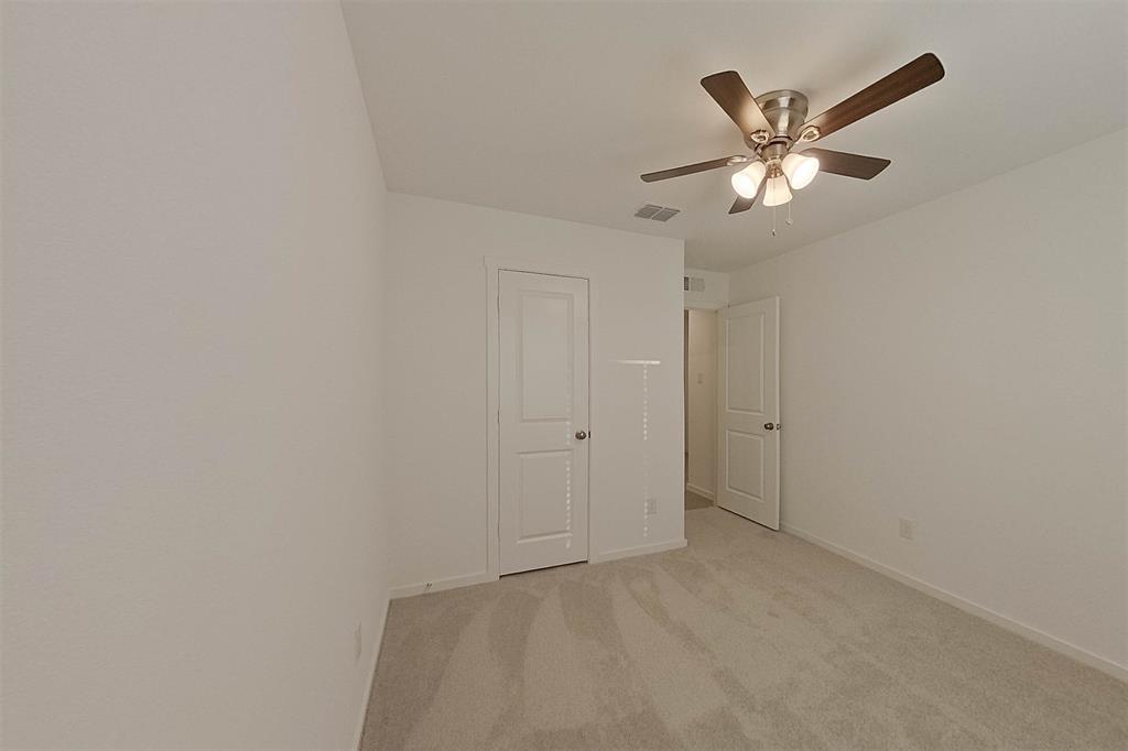 834 Ginkgo Way Princeton, TX 75407 - Photo 7 of 27 a view of a livingroom with a chandelier fan