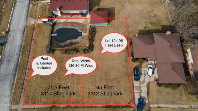 a view of road with multi story residential apartment building in front of it