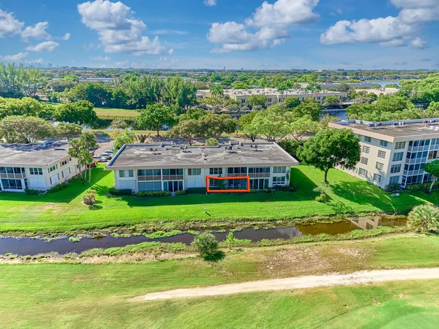 a view of a house with a big yard