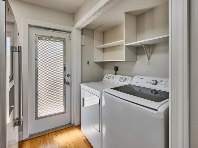 a utility room with dryer and washer