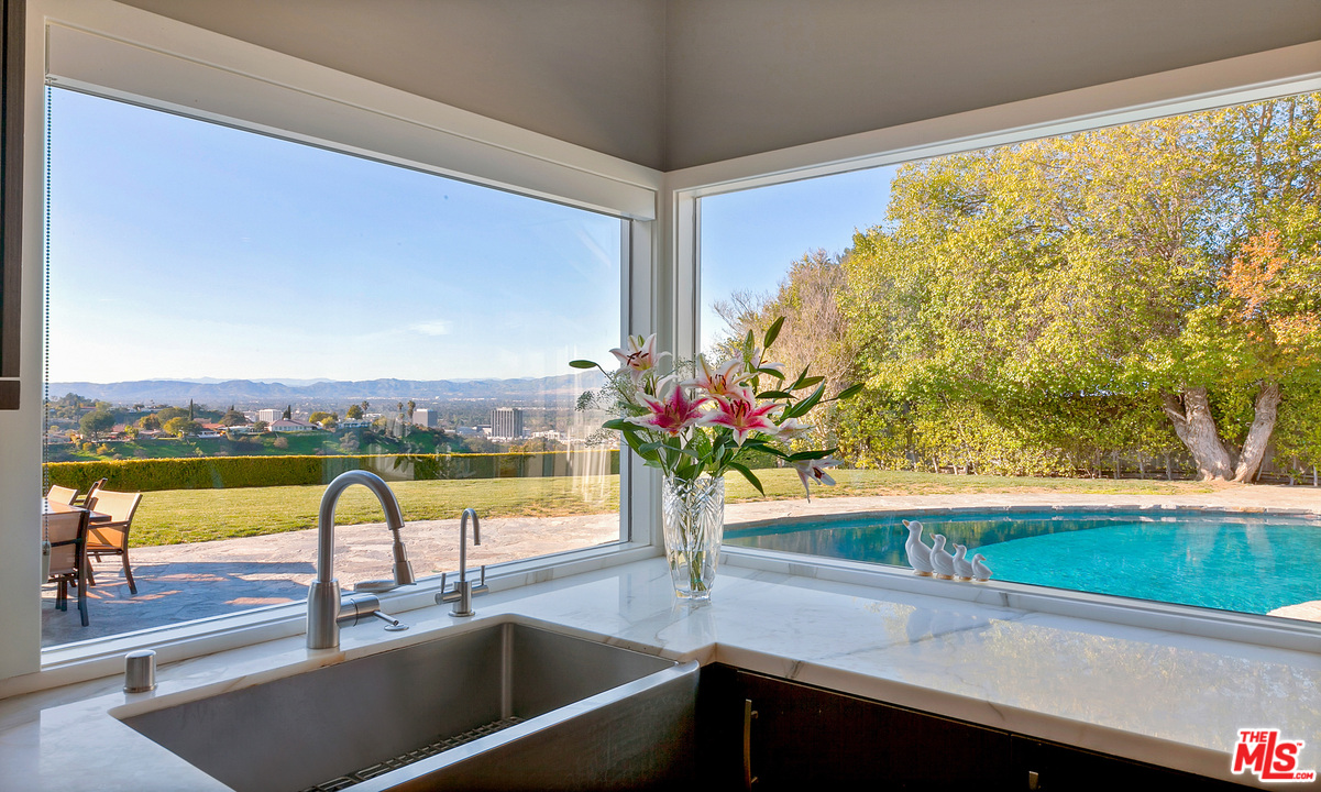 3921 Cody Road Sherman Oaks, CA 91403 - Photo 12 of 36 a view of a lake from a balcony