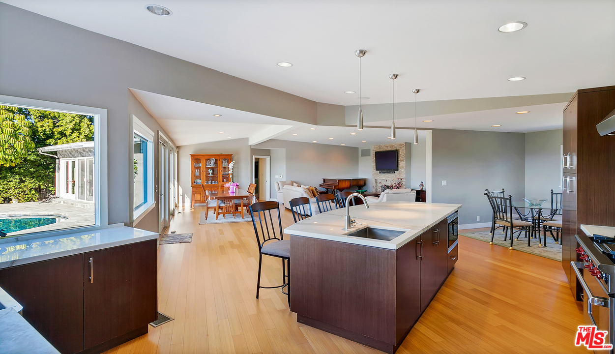 3921 Cody Road Sherman Oaks, CA 91403 - Photo 8 of 36 a view of a dining room with furniture window and outside view