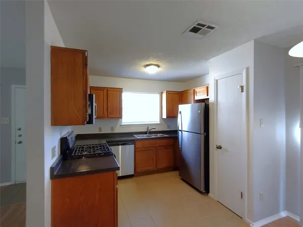 $1,395 | 12312 Dellrey Drive, Unit A, Austin, TX 78758