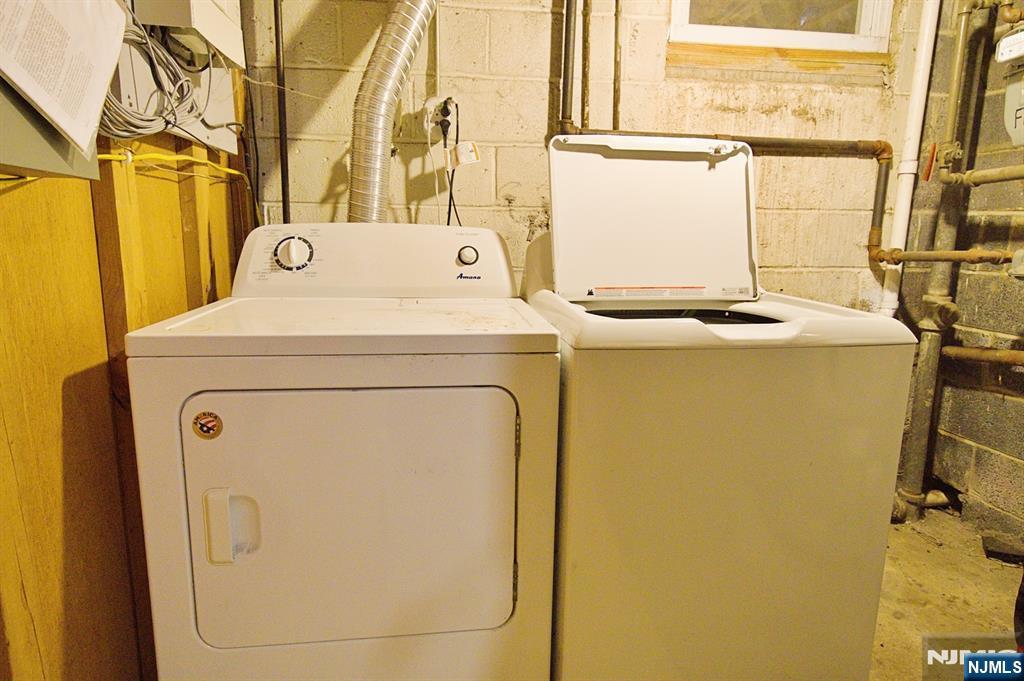 1160 River Road, Unit 1 Edgewater, NJ 07020 - Photo 18 of 18 a utility room with dryer and washer