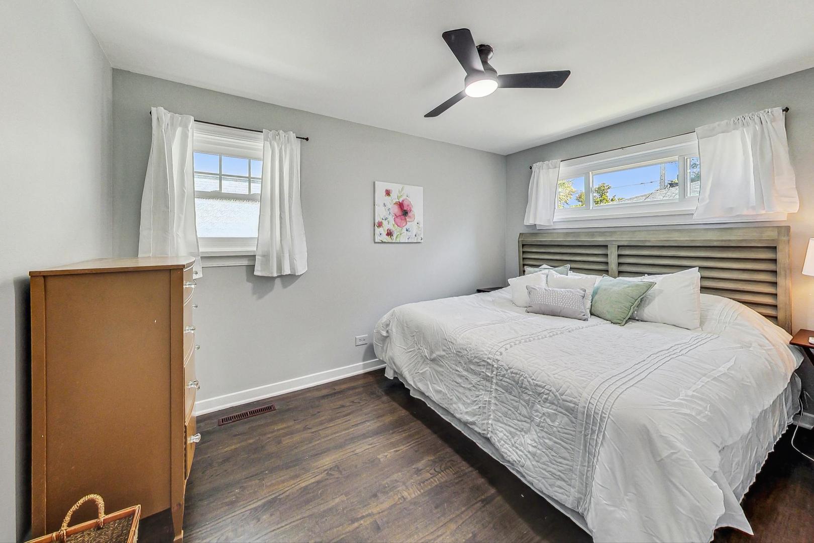 467 Ida Lane Elmhurst, IL 60126 - Photo 11 of 18 a bedroom with a large bed and a window