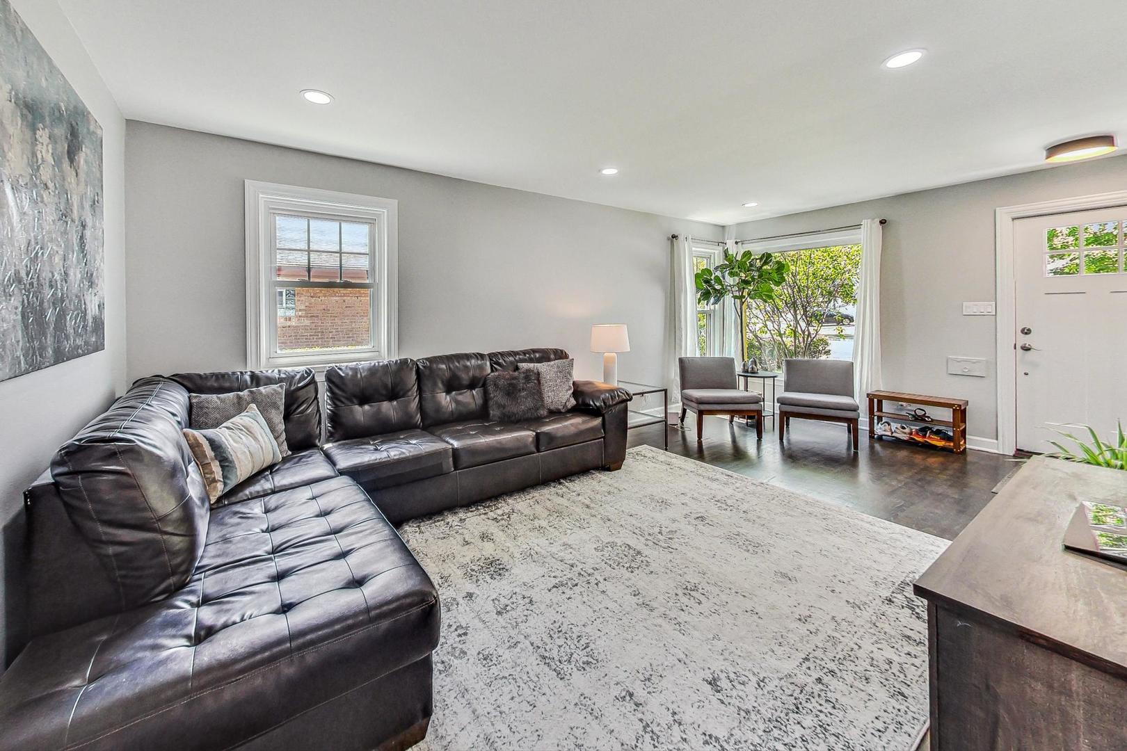 467 Ida Lane Elmhurst, IL 60126 - Photo 3 of 18 a living room with furniture and a large window