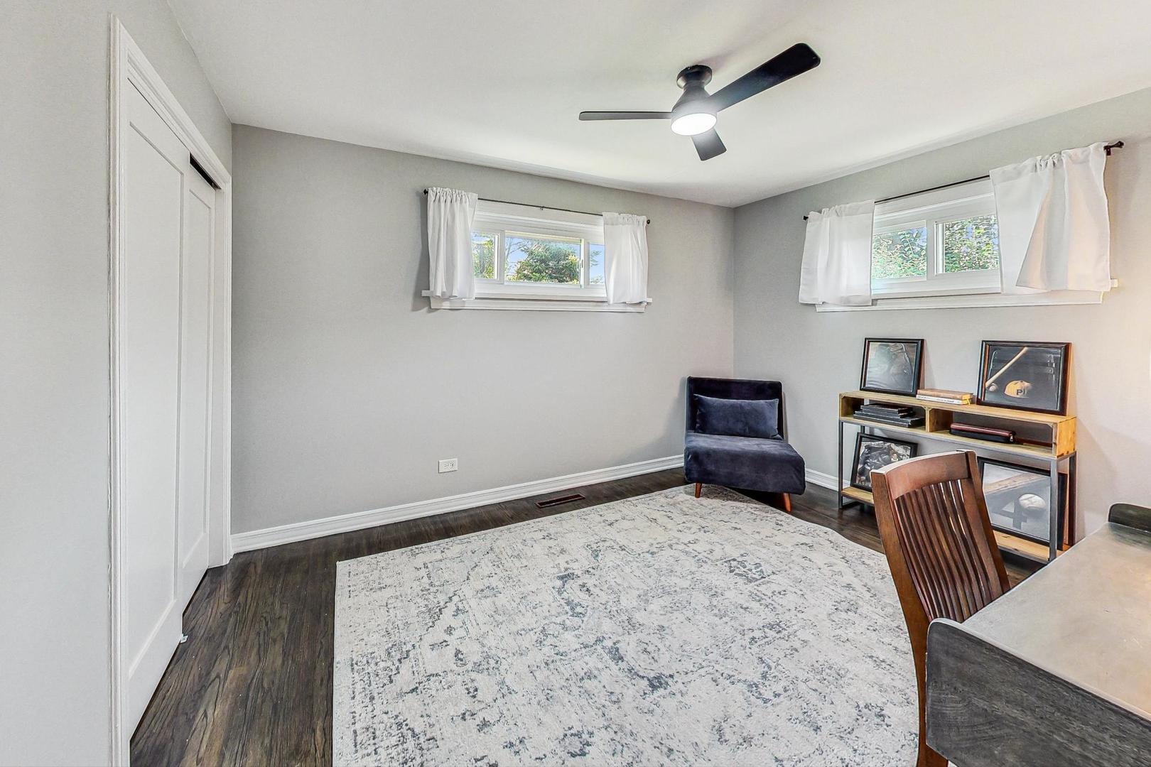 467 Ida Lane Elmhurst, IL 60126 - Photo 9 of 18 a bedroom with furniture and a window