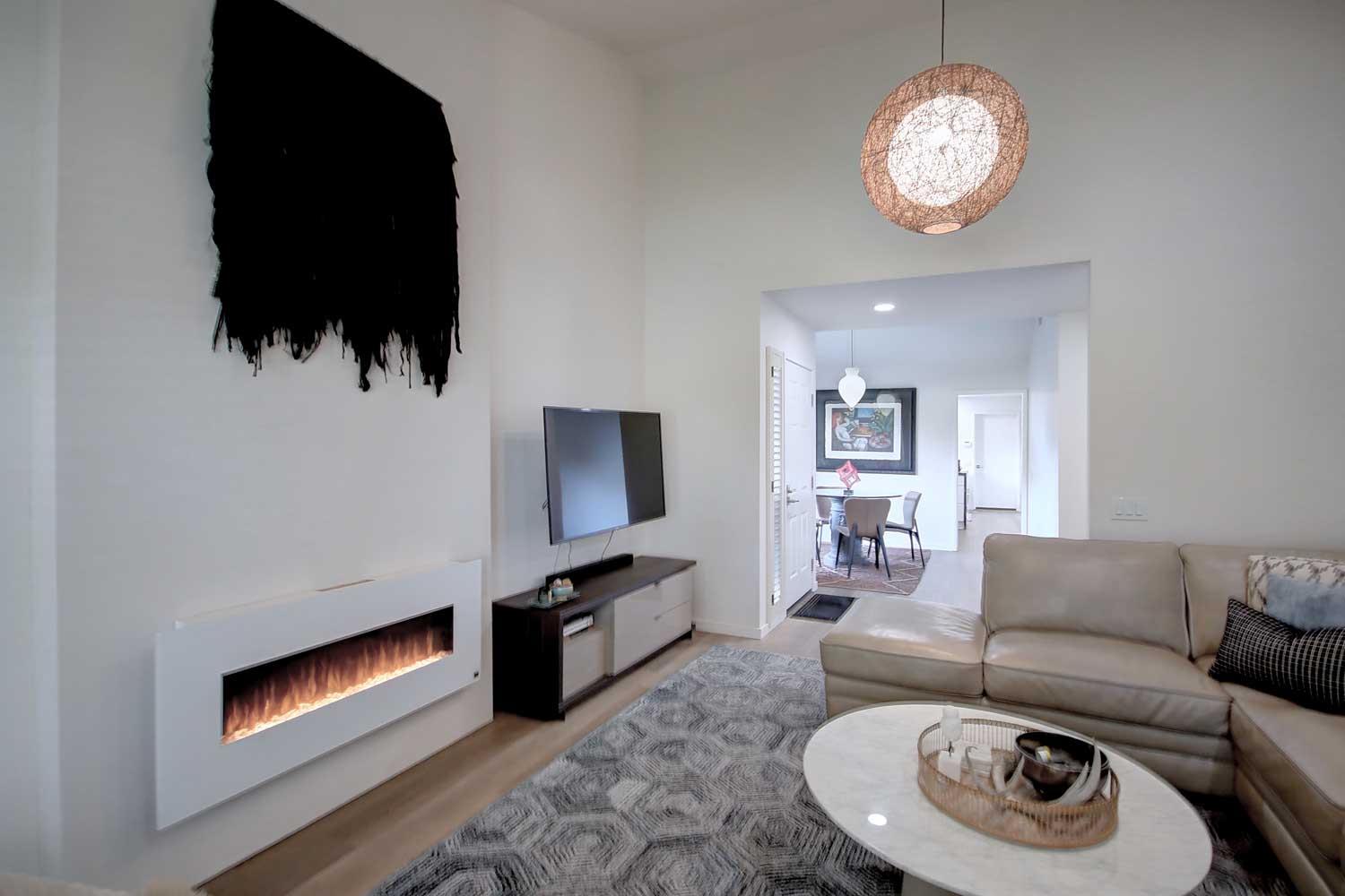 11418 Coloma Road Gold River, CA 95670 - Photo 13 of 40 a living room with furniture and a flat screen tv