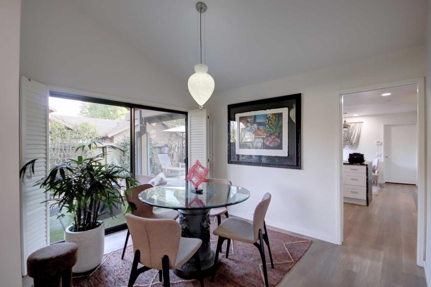 11418 Coloma Road Gold River, CA 95670 - Photo 17 of 40 a view of a dining room with furniture window and wooden floor