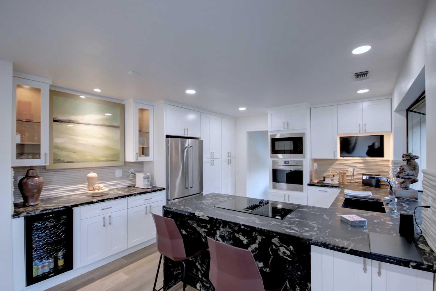 11418 Coloma Road Gold River, CA 95670 - Photo 18 of 40 a kitchen with stainless steel appliances a sink stove and refrigerator