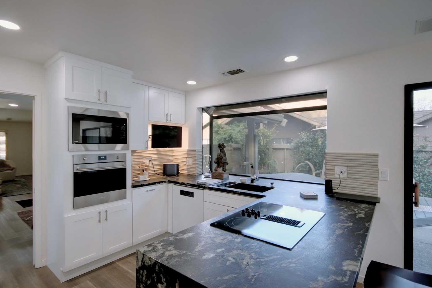11418 Coloma Road Gold River, CA 95670 - Photo 20 of 40 a living room with furniture and a flat screen tv