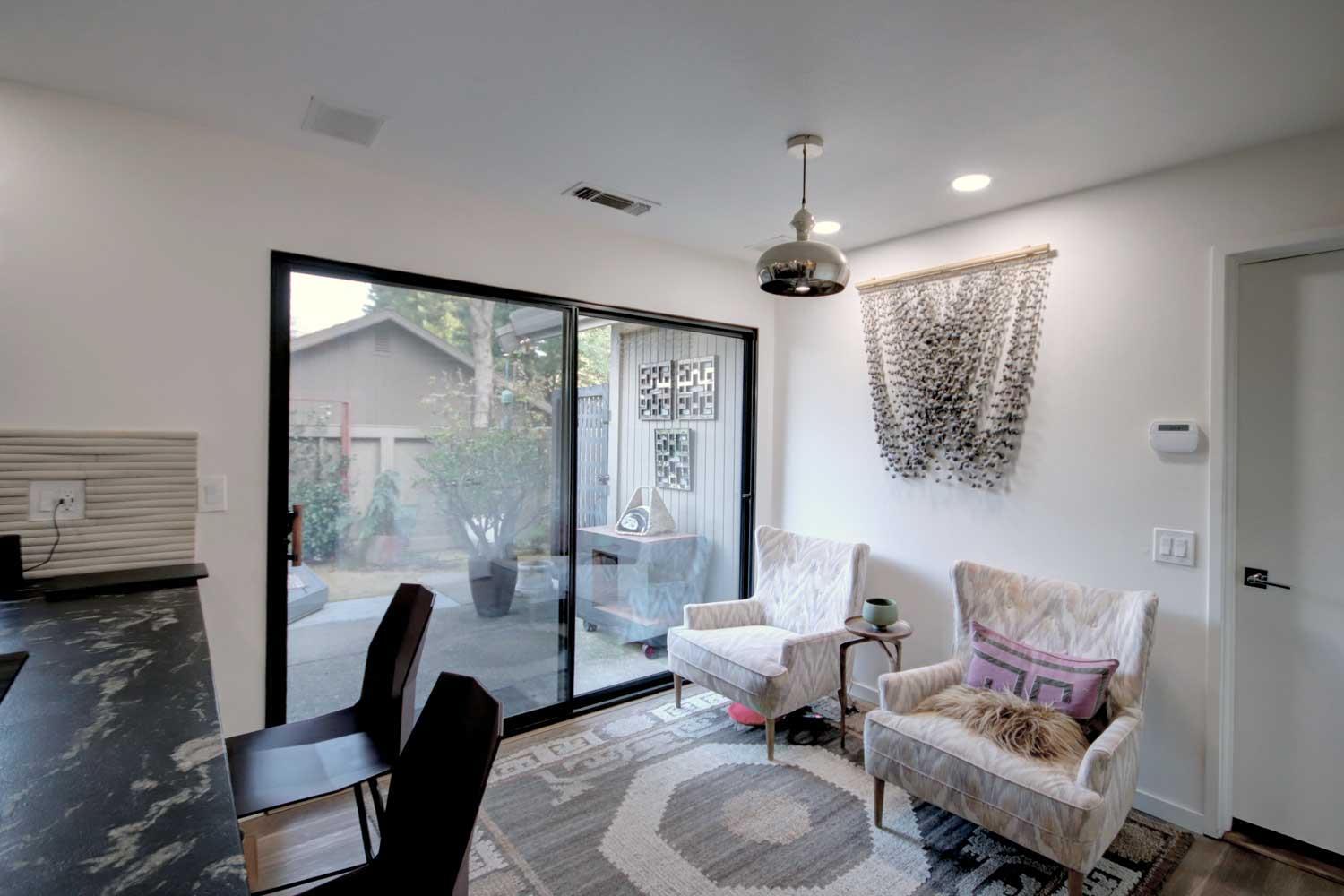 11418 Coloma Road Gold River, CA 95670 - Photo 23 of 40 a living room with furniture and a window